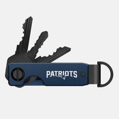 https://cdn.shopify.com/s/files/1/0613/6213/files/KEYCASE_Patriots_Premium-1_00681d18-b1a5-4623-9df3-252ca2f472f9.jpg?v=1728483739
