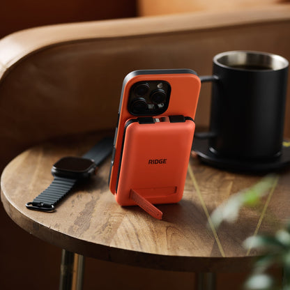 https://cdn.shopify.com/s/files/1/0613/6213/files/MagneticPowerbank-Orange-Lifestyle2_69d2fb17-6f03-4c96-b33b-41e55d0bef2e.jpg?v=1757285828