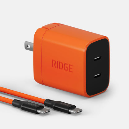 https://cdn.shopify.com/s/files/1/0613/6213/files/Power-Adapter-Kit-Basecamp-Orange-Render1_519888af-d939-46aa-ab82-34309ef3eba4.jpg?v=1759962923