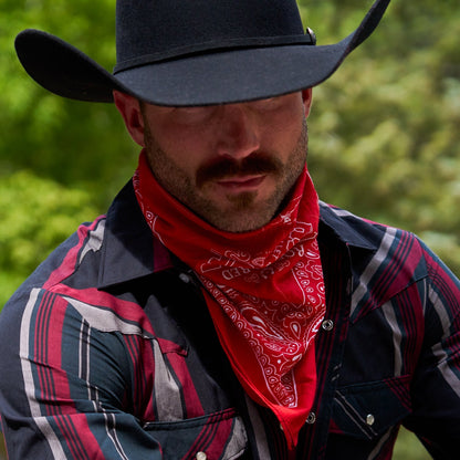 https://cdn.shopify.com/s/files/1/0613/6213/files/Rodeo-Red-Bandana-Lifestyle2.jpg?v=1758792205