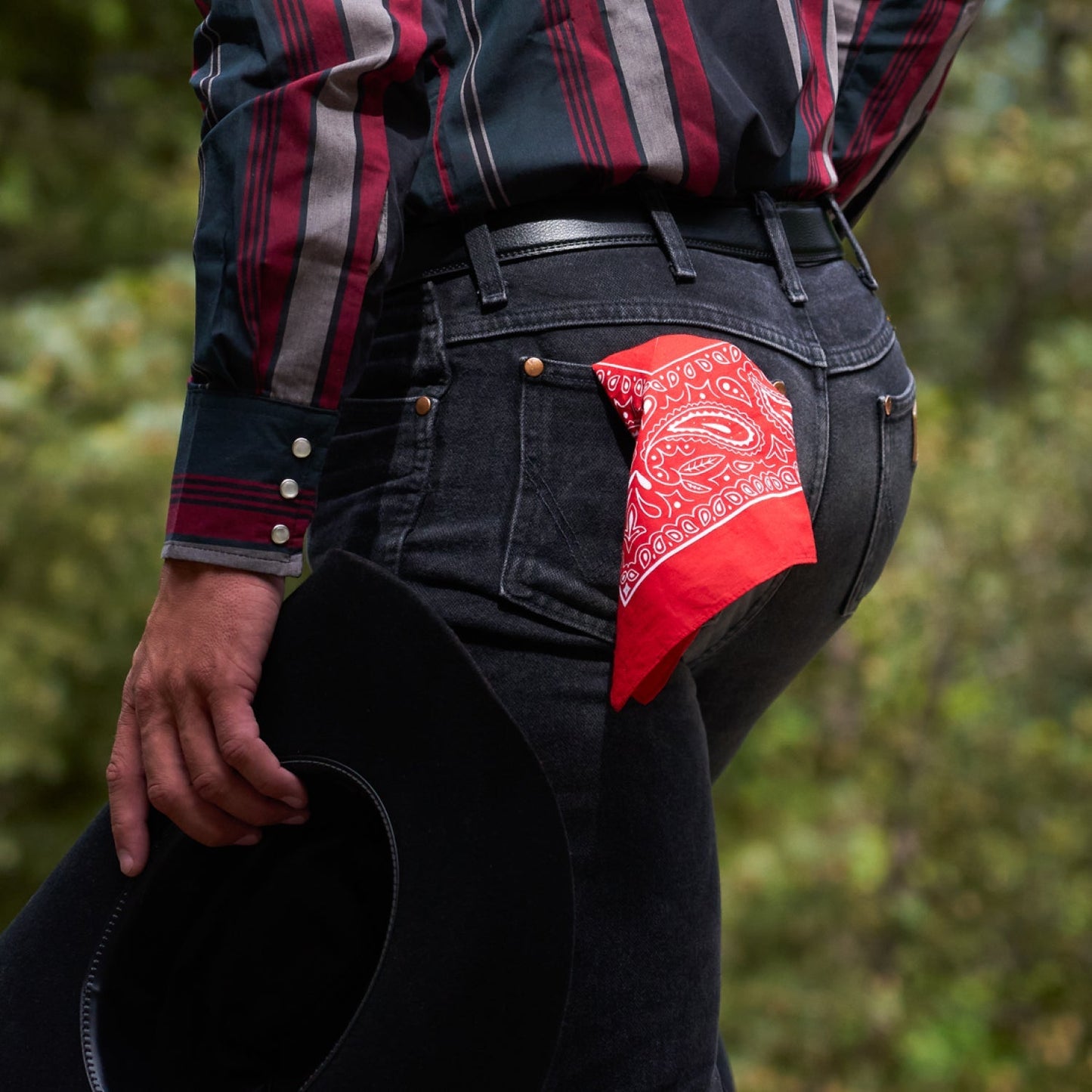https://cdn.shopify.com/s/files/1/0613/6213/files/Rodeo-Red-Bandana-Lifestyle3.jpg?v=1758791897