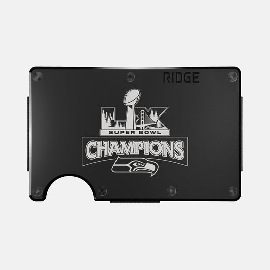 https://cdn.shopify.com/s/files/1/0613/6213/files/Seahawks-Wallet-THUMBNAIL.jpg?v=1770166891