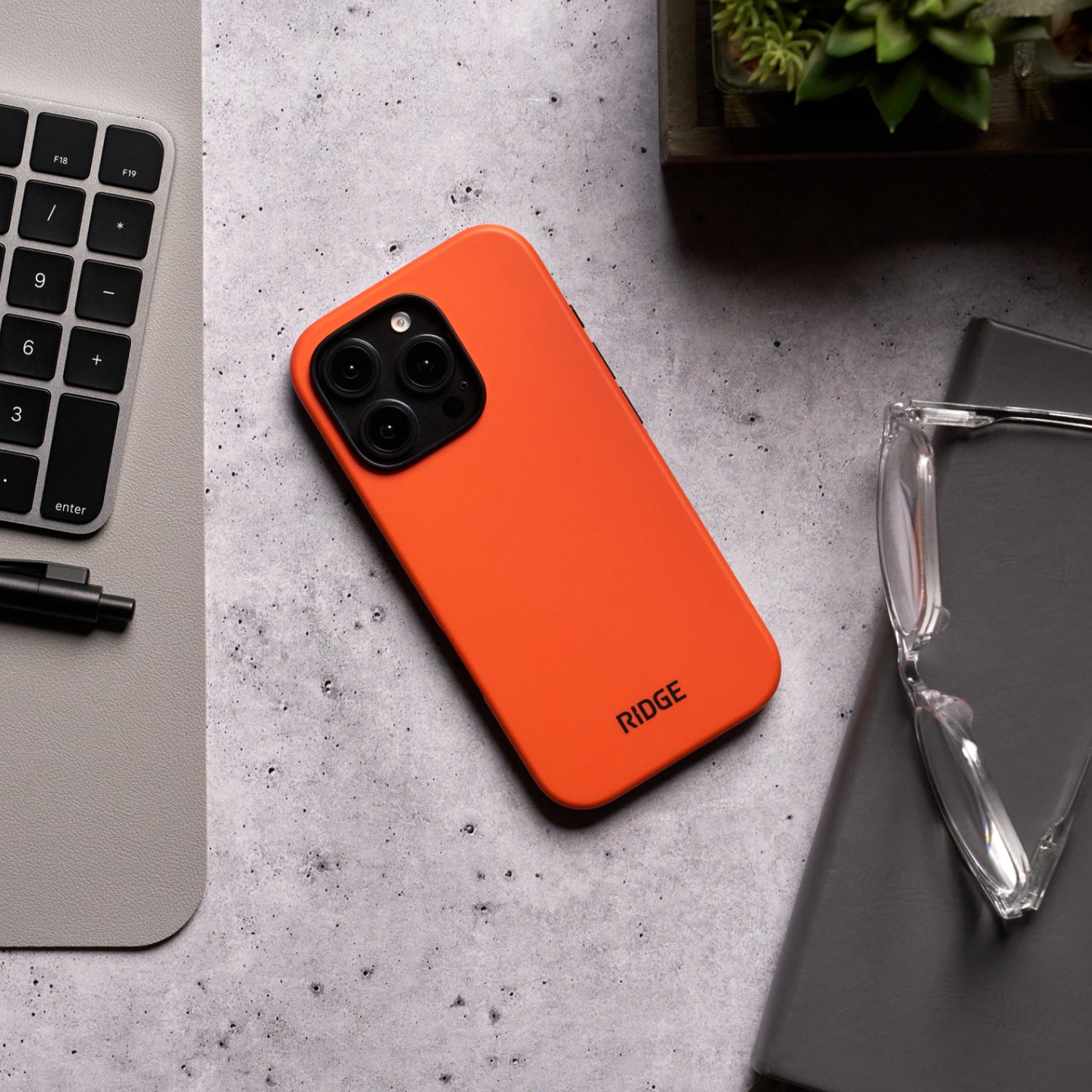 https://cdn.shopify.com/s/files/1/0613/6213/files/iPhone16Promax-Orange-Lifestyle1.jpg?v=1757285835