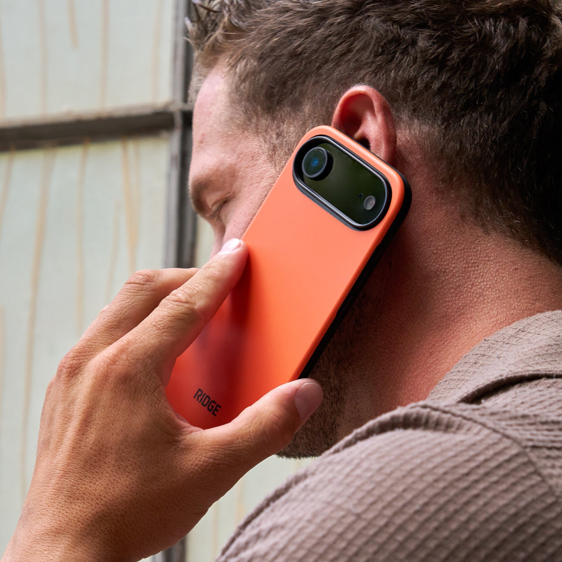 https://cdn.shopify.com/s/files/1/0613/6213/files/iPhone17Air-Orange-Lifestyle2.jpg?v=1757285794